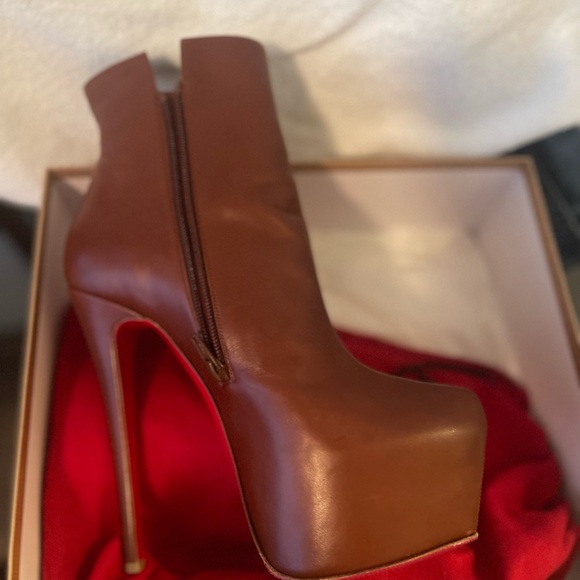 Christian Louboutin Daff Booty. CLASSIC ITEM. Hard to find!
